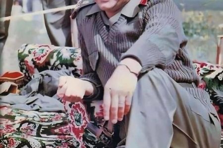 صدام حسین با سربند کردی